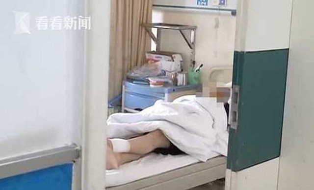 Li hiện điều trị trong bệnh viện thành phố Nam Xương, tỉnh Giang Tây. Ảnh: Jiangxi TV.