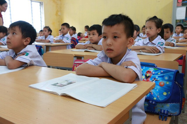 Học sinh tiểu học trong giờ học tiếng Việt ở Hà Nam. (Ảnh: Đ. Cường).