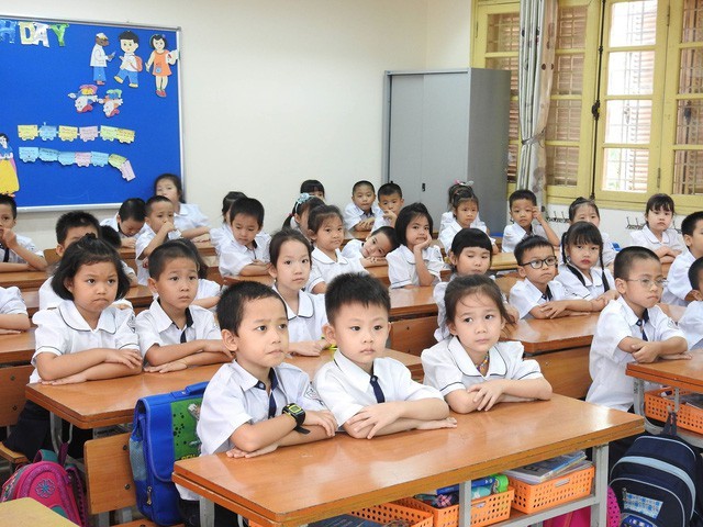 Học sinh của một trường tại Cầu Giấy, Hà Nội trong năm học trước. (Ảnh: Đ.T).