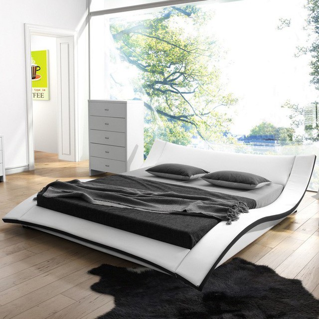 1. Giường viền cong với tạo hình hiện đại và nghệ thuật khiến phòng ngủ trở nên độc đáo hơn.