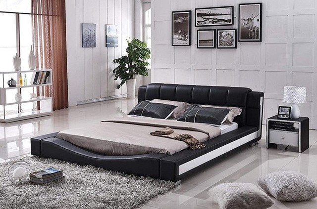 13. Thiết kế giường bọc da có tính thẩm mỹ cao nhờ sự pha trộn màu sắc đen và trắng. Không những thế, thiết kế này còn mang lại luồng năng lượng tích cực cho giấc ngủ của bạn.