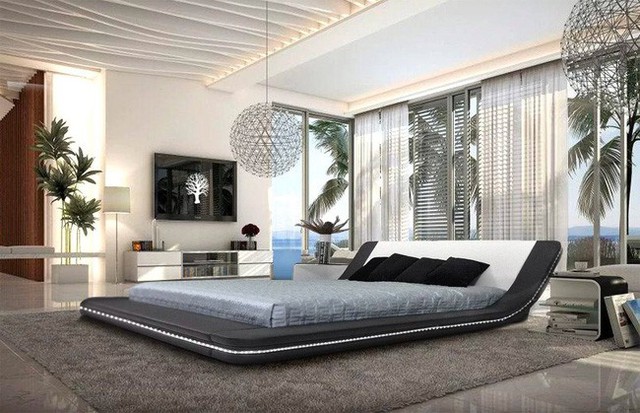 4. Giường lớn được bọc nệm êm từ da tự nhiên với một dải đèn led quanh thân. Chiếc giường khá hoàn hảo với vẻ đẹp tinh tế, hiện đại.