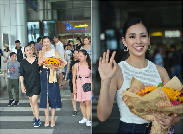 Trước đó, đúng 12h10, Hoa hậu Trần Tiểu Vy có mặt tại sảnh sân bay Đà Nẵng và được chào đón bởi đám đông gồm nhiều người thân, bạn bè. Chị Huỳnh Thị Thu Trang, mẹ Tiểu Vy, nổi bật trong nhóm người ra đón con gái. Ảnh: BTC.