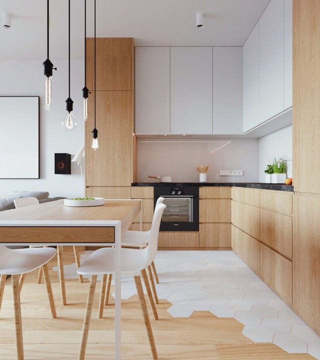 
Các gia đình lựa chọn chất liệu gỗ tự nhiên sáng màu đi kèm gam màu trắng chủ đạo để tạo nên vẻ nền nã, thoải mái bên trong căn bếp gia đình.
