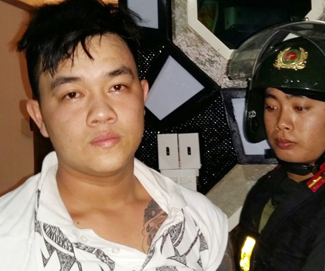 Nguyễn Anh Tuấn khi bị cảnh sát bắt giữ. Ảnh: Công an An Giang.
