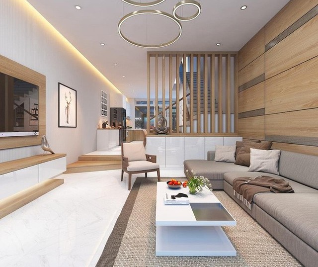 
Hệ nan gỗ giúp chia không gian phòng khách với cầu thang.
