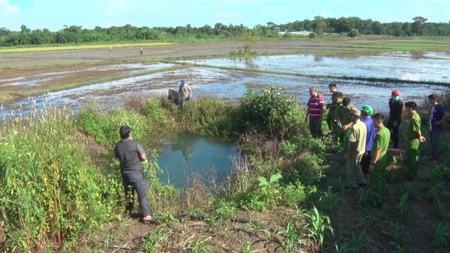 Bình Phước: Phát hiện thi thể phụ nữ dưới ao nước - Ảnh 1.