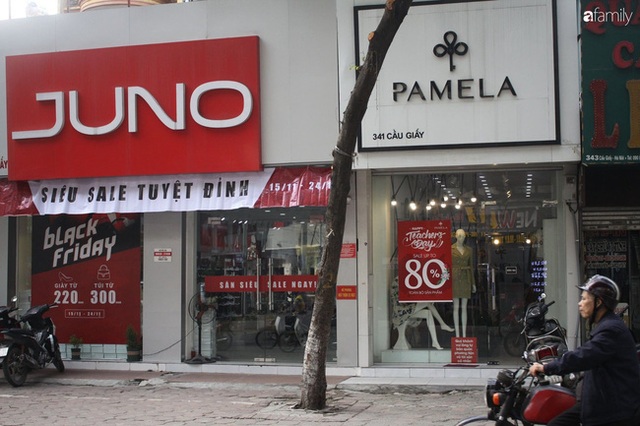 Nhiều cửa hàng thời trang ở Hà Nội đã chạy đà cho ngày mua sắm Black Friday bằng việc treo biển giảm giá mạnh tới 80% các sản phẩm - Ảnh 6.