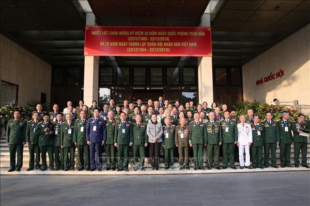  Chủ tịch Quốc hội Nguyễn Thị Kim Ngân gặp mặt cựu chiến binh bộ đội đặc công  - Ảnh 4.