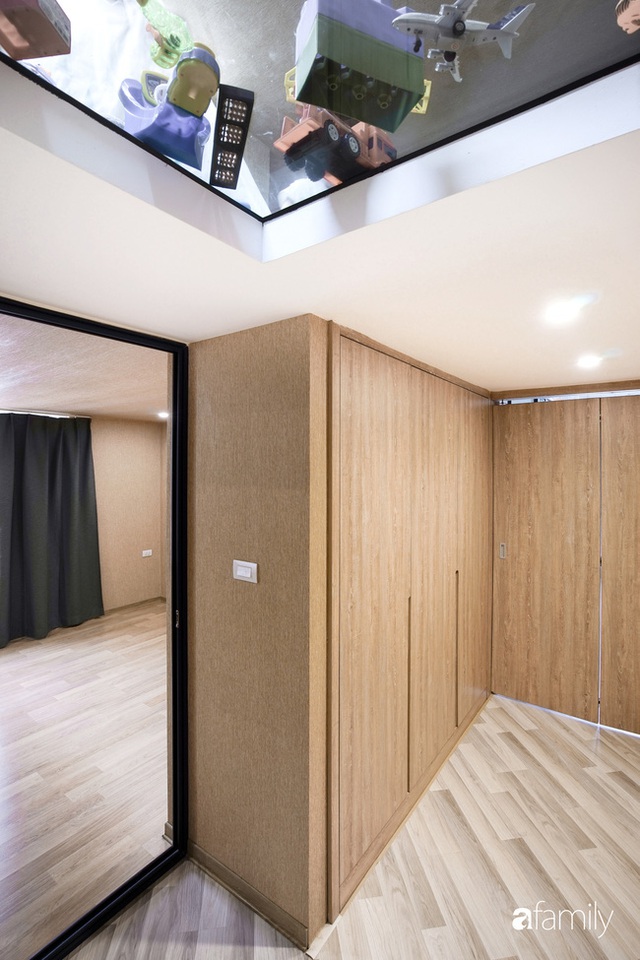 Ngôi nhà 2 tầng mái dốc với trần bằng gỗ ẩn mình trong căn hộ chung cư 103m² ở Hà Nội - Ảnh 20.