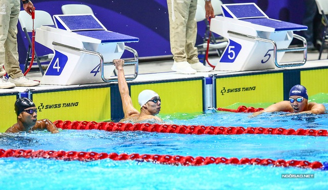 Huy Hoàng khoe cơ bắp sau khi phá kỷ lục SEA Games - Ảnh 5.