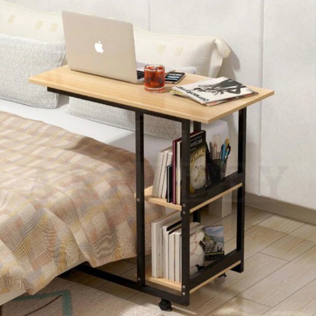 
12. Chiếc bàn này sẽ trở thành món đồ nội thất yêu thích của bạn vì bạn có thể đặt tách cà phê hoặc sử dụng máy tính xách tay trên đó trong khi vẫn ấm cúng trong chăn.

