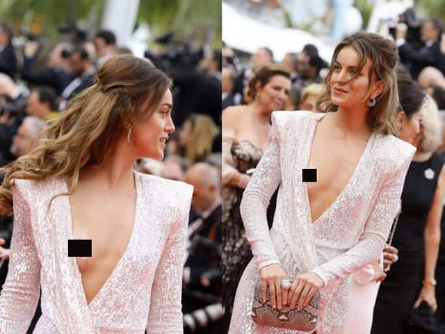 
Liên hoan phim Cannes năm nay còn có thêm một pha hớ hênh khác ngay buổi khai mạc, 14/5. Người mẫu Heidi Lushtaku mặc váy xẻ bạo, lộ một bên ngực trong lúc xoay người tạo dáng.
