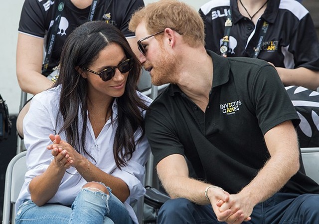 Harry và Meghan lần đầu xuất hiện công khai cùng nhau ở Thế vận hội Invictus Games năm 2016 tại Florida, Mỹ. Ảnh: PA.