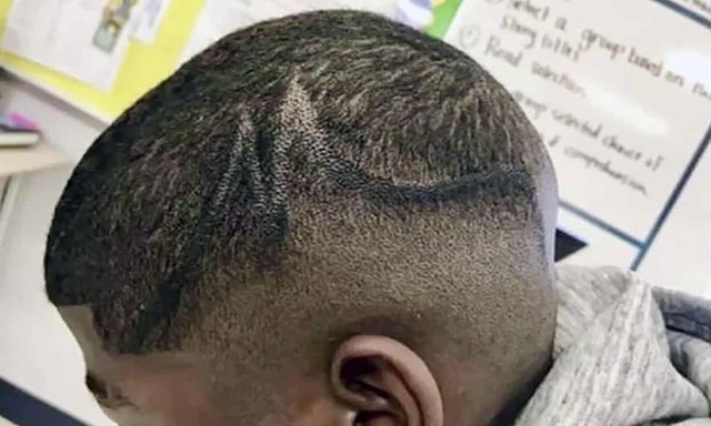 Nam sinh bị hiệu phó và giáo viên vẽ lên đầu vì cắt tóc sai quy định - Ảnh 1.