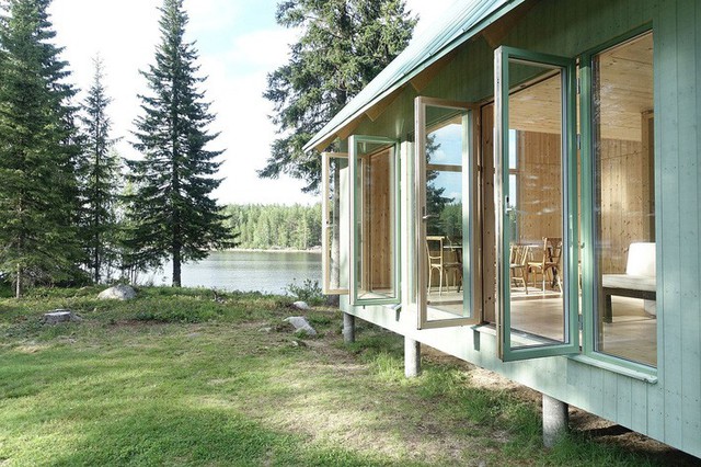 Ngôi nhà nhỏ bằng gỗ màu xanh ven hồ thực sự là thiên đường cho những ai ghét sự ồn ào của thành phố - Ảnh 3.