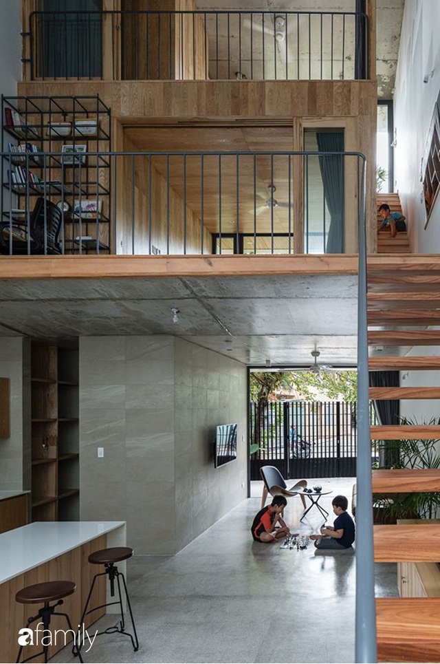 Ngôi nhà phố đẹp tinh tế với bản hòa tấu giữa vật liệu gỗ và ánh sáng ở Quy Nhơn dành cho gia đình 4 người - Ảnh 12.