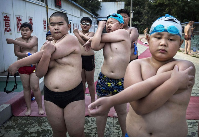 Học sinh Trung Quốc bị cho điểm thấp vì béo phì, cận thị - Ảnh 3.