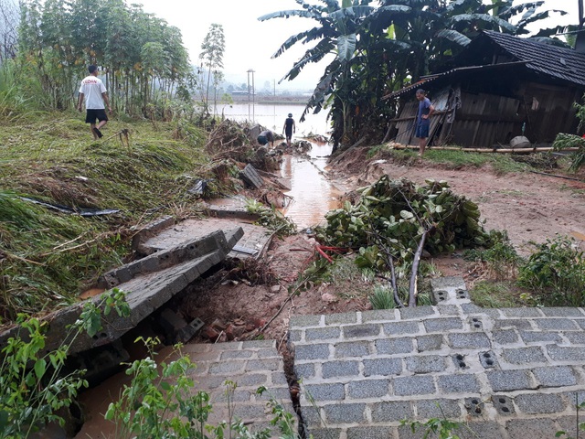 Người dân Lào Cai khắc phục hậu quả sau trận mưa lớn kỷ lục 63 năm qua - Ảnh 2.