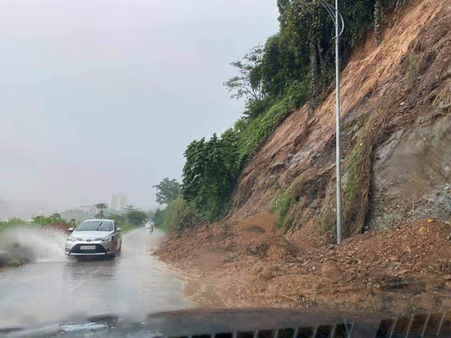Người dân Lào Cai khắc phục hậu quả sau trận mưa lớn kỷ lục 63 năm qua - Ảnh 7.