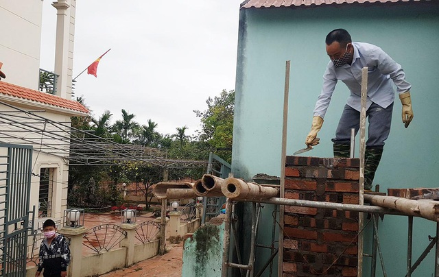 Thuốc khử trùng bao trùm làng quê có nhiều người nhiễm nCoV nhất cả nước - Ảnh 10.