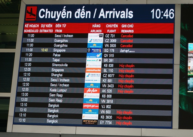Sân bay Tân Sơn Nhất vắng vẻ vì COVID-19 - Ảnh 5.