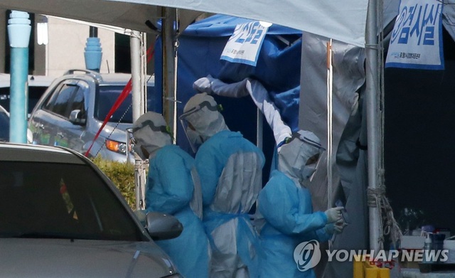 Hàn Quốc thêm gần 370 trường hợp nhiễm, 50 người tử vong vì COVID-19 - Ảnh 3.