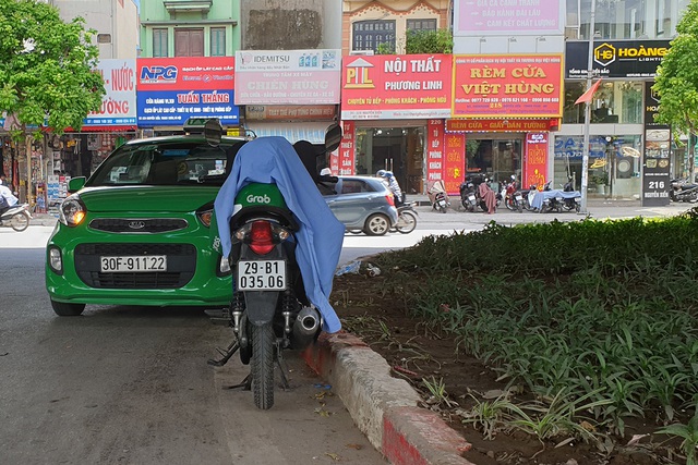 Những điểm nghỉ trưa tránh nóng lý tưởng của dân lao động - Ảnh 7.