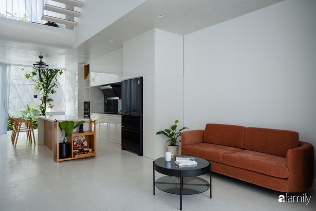 Ngôi nhà phố 90m² màu trắng mang một thiết kế hiện đại khác lạ ở quận 7, TP. HCM - Ảnh 6.