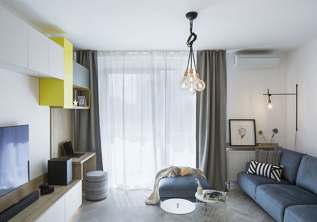 Sự pha trộn màu sắc ấn tượng với 3 gam màu: Xanh dương, vàng và xám trong một căn hộ hiện đại - Ảnh 1.