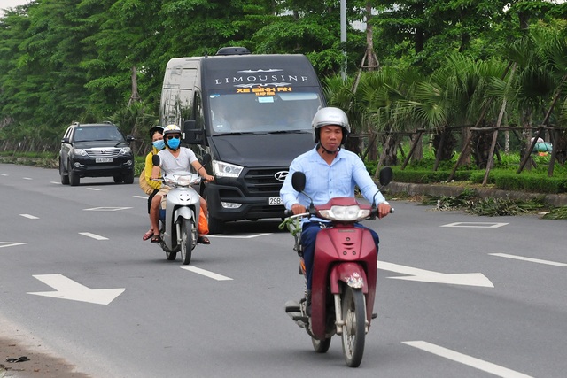 Hà Nội: Vẫn có nhiều người dân ra đường không đeo khẩu trang - Ảnh 8.