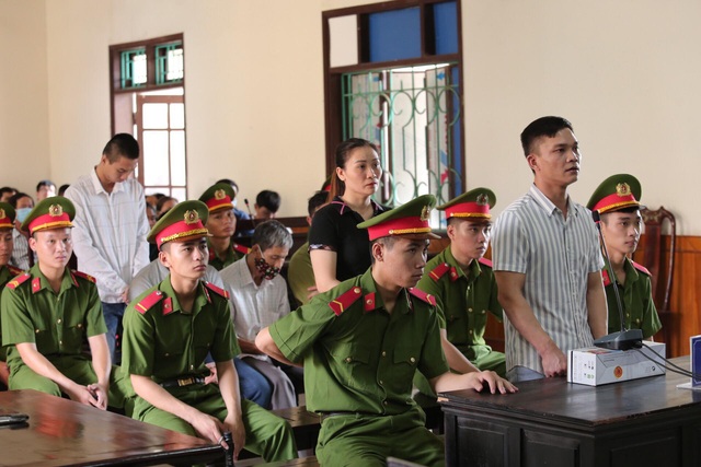 Hà Tĩnh tuyên án 7 bị cáo đưa người sang Anh trái phép - Ảnh 1.