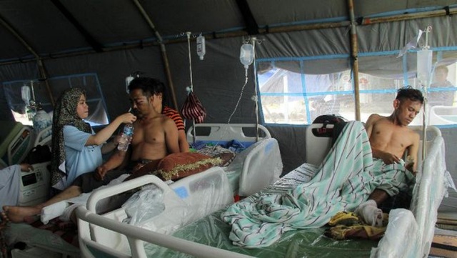 Nạn nhân vụ động đất ở Indonesia tăng lên 73 người - Ảnh 2.