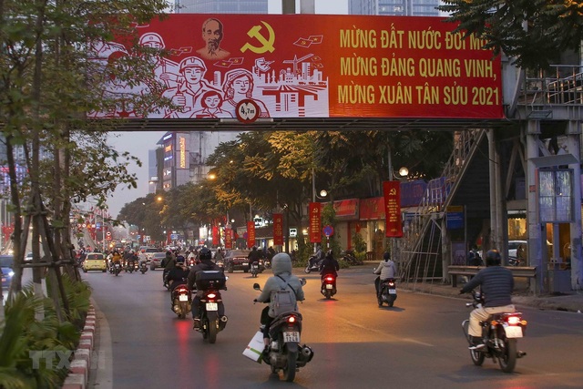 Thủ đô Hà Nội rực rỡ cờ hoa chào mừng Đại hội XIII của Đảng - Ảnh 9.