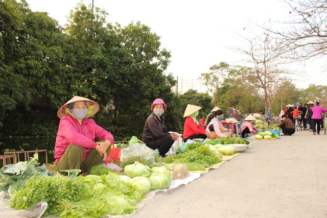 Hình ảnh khác lạ có 1-0-2 tại phiên chợ đặc biệt họp duy nhất sáng mồng 2 Tết  ở Hải Dương - Ảnh 9.