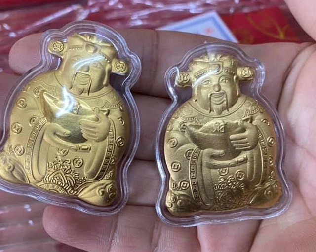 Thần Tài mạ vàng Trung Quốc giá 15.000 hút khách mua - Ảnh 2.