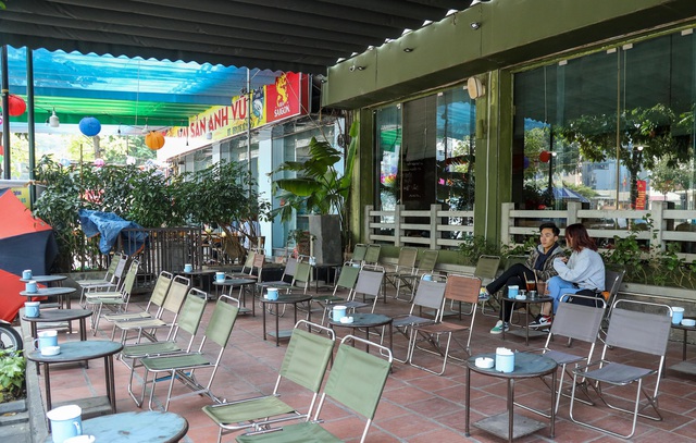 Nhà hàng, quán nhậu Hà Nội vắng không một bóng người, ngậm ngùi đồng loạt treo biển nghỉ Tết sớm - Ảnh 8.