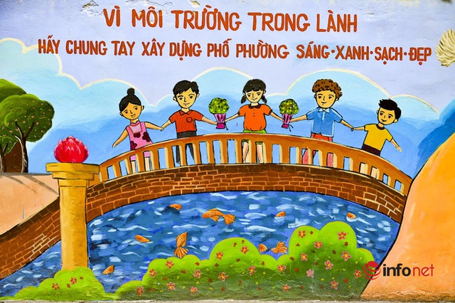  Hà Nội: Bức tường bích họa xóa ký ức vụ cháy kinh hoàng 2 năm trước ở Công ty Rạng Đông - Ảnh 6.