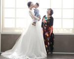 Xôn xao hình ảnh Thu Quỳnh mặc váy cưới đứng cạnh mẹ và con trai