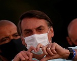 Tổng thống Brazil nói nhà báo dễ chết vì Covid