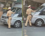 Hà Nội: Xử phạt tài xế xe 16 chỗ nhấn ga đẩy CSGT đi lùi trên đê Nguyễn Khoái
