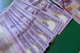Đại gia rởm 'mua vui' bằng USD giả Đại gia rởm 'mua vui' bằng USD giả