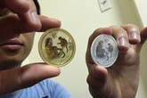 Mừng tuổi tờ 100 USD bằng vàng thật Mừng tuổi tờ 100 USD bằng vàng thật