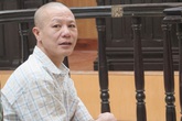 Nụ cười bí hiểm của kẻ gây thảm án Nụ cười bí hiểm của kẻ gây thảm án