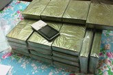 Bắt đối tượng người Lào vận chuyển 30 bánh heroin về Việt Nam Bắt đối tượng người Lào vận chuyển 30 bánh heroin về Việt Nam