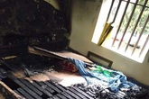 Nghi vấn con tẩm xăng đốt mẹ ở Hà Nam Nghi vấn con tẩm xăng đốt mẹ ở Hà Nam