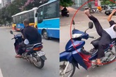 Danh tính ông già mở nhạc nằm trên yên, lái xe bằng chân Danh tính ông già mở nhạc nằm trên yên, lái xe bằng chân