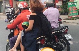 Ngồi trên xe ôm, chỉ bằng một hành động cô gái khiến cả phố ngoái lại nhìn Ngồi trên xe ôm, chỉ bằng một hành động cô gái khiến cả phố ngoái lại nhìn