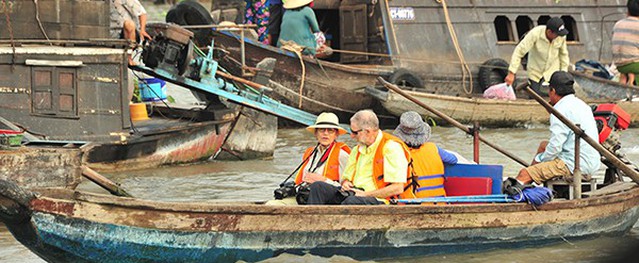 Tour du lịch tham quan chợ nổi Cái Răng hút khách nước ngoài Tour du lịch tham quan chợ nổi Cái Răng hút khách nước ngoài
