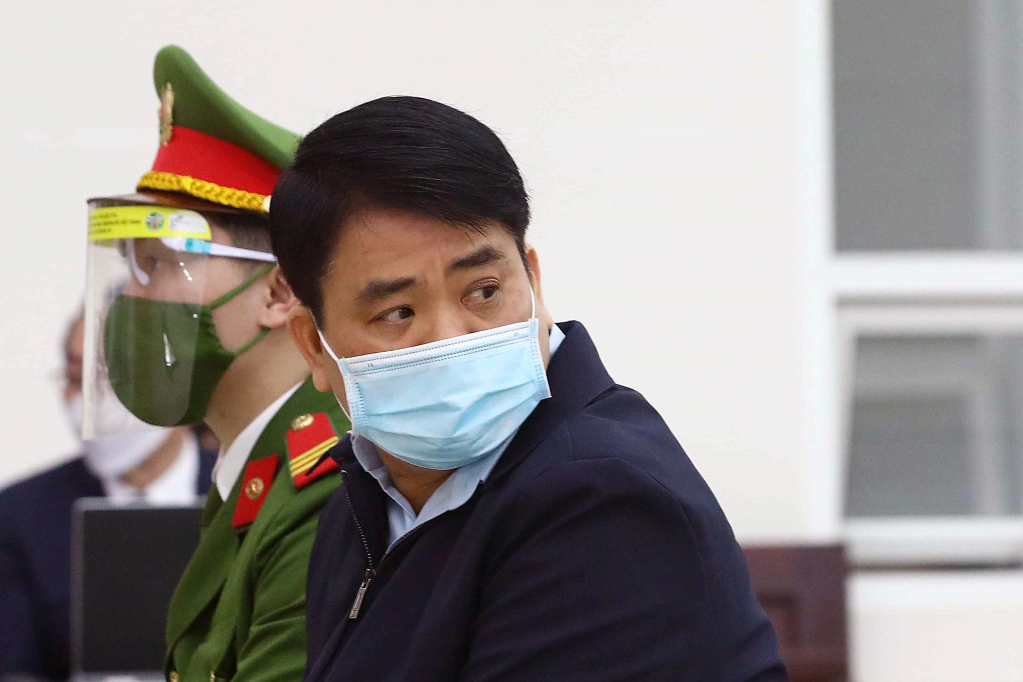 Ông Nguyễn Đức Chung lĩnh 8 năm tù, phải bồi thường 25 tỷ đồng - Ảnh 1.